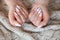 Model woman showing .light pale pink nude shellac manicure on lo