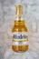 Modelo Especial beer bottle clear bright yellow colour on ice