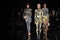 Models walk the runway at the Versace Pre-Fall 2019 Collection