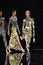 Models walk the runway at the Versace Pre-Fall 2019 Collection