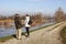 MODENA , ITALY 16 MARCH 2018 : senior man and girls swollen as the river`s embankments overflow after days of heavy rain