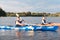 Modern active couple wearing life vests caring about safety