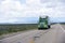 Modern American semi truck and reefer trailer on Nevada road