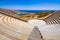 Modern amphitheater overlooking the Aegean Sea and Milopotas beach on Cyclades Island of Ios.