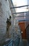 Modern architectural glass skylight corridor extension added to existing old historic stone building in Sydney Mint in downtown