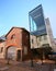 Modern architectural glass stairwell extension added to existing old historic brick building in Sydney Mint in urban downtown CBD