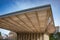 Modern architecture, Zug, Switzerland.  Angular roofline of the Stadtgarten Pavillon with clear blue sky background