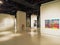 Modern art gallery space with paintings