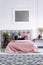Modern artwork and pink bedding