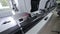 Modern automatic medical hematology analyzer. Test tubes on robotic conveyor.