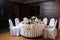 Modern banquet hall. Decorated tables, elegant setting, beautiful interior