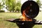 Modern barbecue grill with fire flames