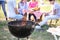 Modern barbecue grill with group of friends outdoors