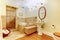 Modern bathroom interior with hardwood floor, white sink, tub wi