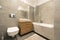 Modern bathroom with tiles on the floor