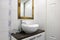 Modern bathroom with white ceramic sink and mirror. sink at bathroom