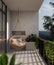 A modern beautiful home balcony with a hanging wicker armchair lounge and a beautiful nature view