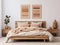 Modern bedroom interior in neutral beige tones. Wooden double bed with pillows, cozy furniture. Abstract terracotta wall art set