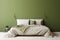 Modern bedrroom with monochrome pastel olive green empty wall. Contemporary interior design with trendy wall color, bed and