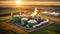 Modern biogas plant between several fields in rural region with sunset background, Bioenergy plant utilizing organic waste,