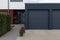 modern black garage in suburban street