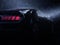 Modern black super muscle car - taillight view