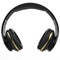 Modern black wireless headphones with golden details - front view