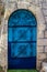 Modern Blue glass door with openwork a beautiful vintage background