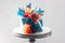 Modern blue and orange birthday cake with wafer paper, chocolate and macaroons. Plain background. Copy space