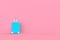 Modern blue suitcases bag on pink background. Travel concept. Vacation trip. Copy space. Minimal style.