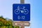 Modern blue Traffic road sign bycicle on blue