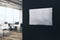 Modern blurry office interior with empty banner on dark wall. 3D Rendering