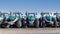 Modern, brand new Arbos tractors on display for sale.