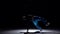 Modern breakdance man jumping starts dancing on black, shadow, slow motion