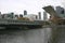 Modern bridge with coastal cityscape of skyscrapers on Yarra River, South Wharf, Melbourne, Victoria, Australia