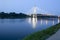 Modern bridge over Vistula River at night. Warsaw,