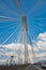 Modern bridge pylon against a blue sky. Detail of the multi-span Cable-stayed suspension Alex Fraiser Bridge BC