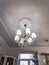 Modern bright ceiling lamp, beautiful crystal chandelier in a new home