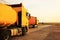 Modern bright trucks on country road