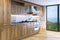 Modern bright wooden kitchen in villa on ocean island . 3D render