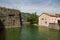 Modern Building by Ancient Kotor Wall