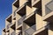 Modern building balcony detail against blue sky