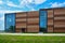 Modern building and blue sky and clouds with office architecture. Suburban building, offices in non-cities