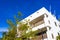 Modern buildings architecture hotels apartments palm Playa del Carmen Mexico