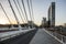 Modern buildings and bridge in university avenue at sunset in C