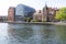 Modern buildings, the seat of the bank and the historic Lloyd Palace on the Brda River, Bydgoszcz, Poland