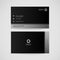 Modern business card template in black, elegant name card design vector illustration.