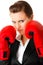 Modern business woman with boxing gloves