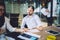 Modern businessman with coworkers in meeting room