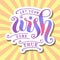 Modern calligraphy lettering of Let your wish come true in colorful gradient with white outlines on yellow background with pink ra